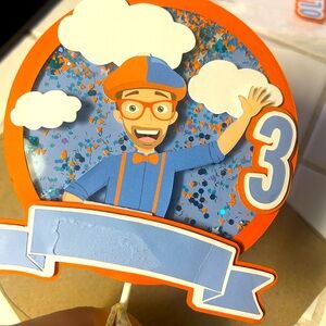 Blippi cake topper